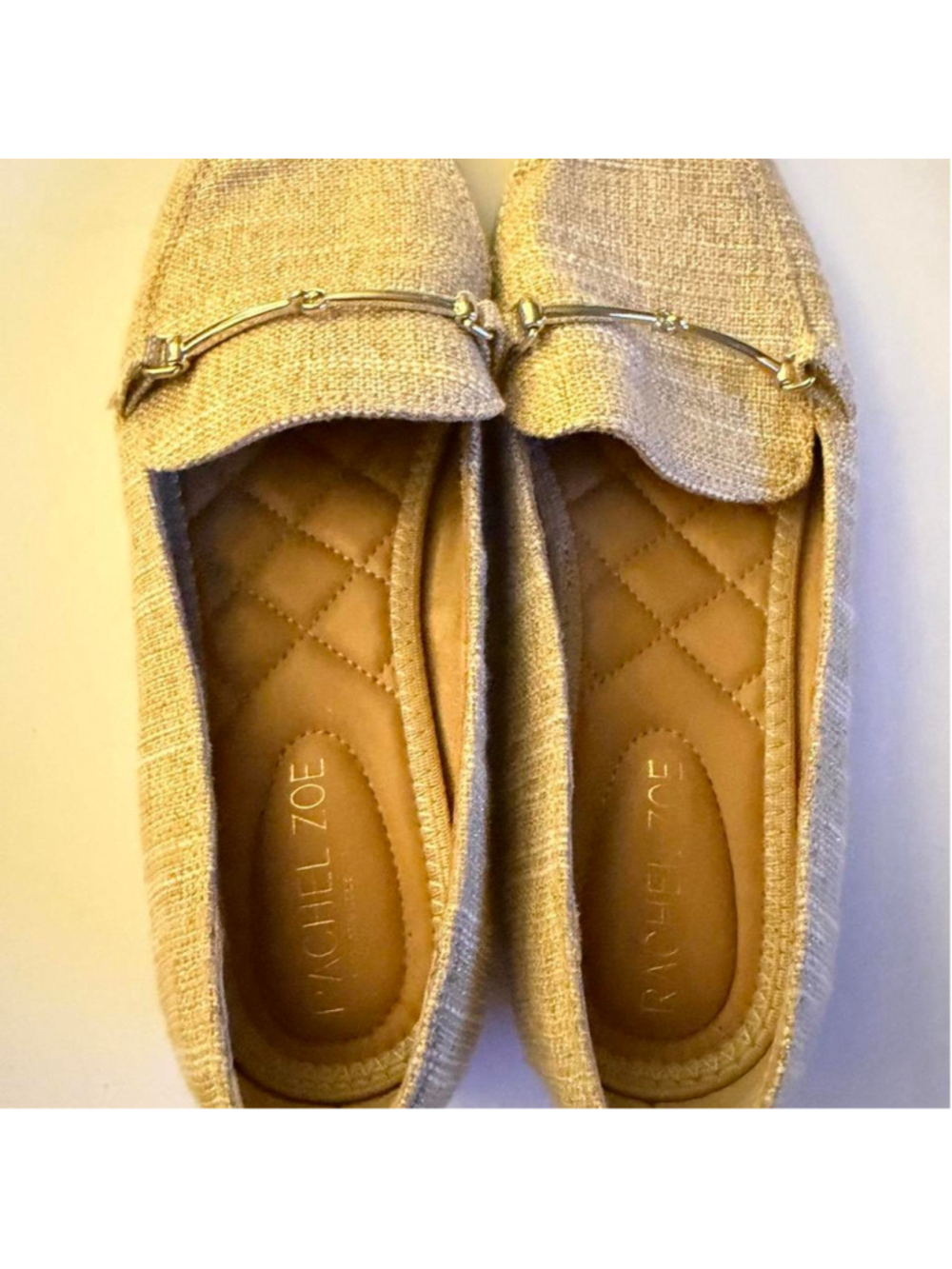 Rachel Zoe metallic gold loafers with a textured woven upper and sleek gold hors